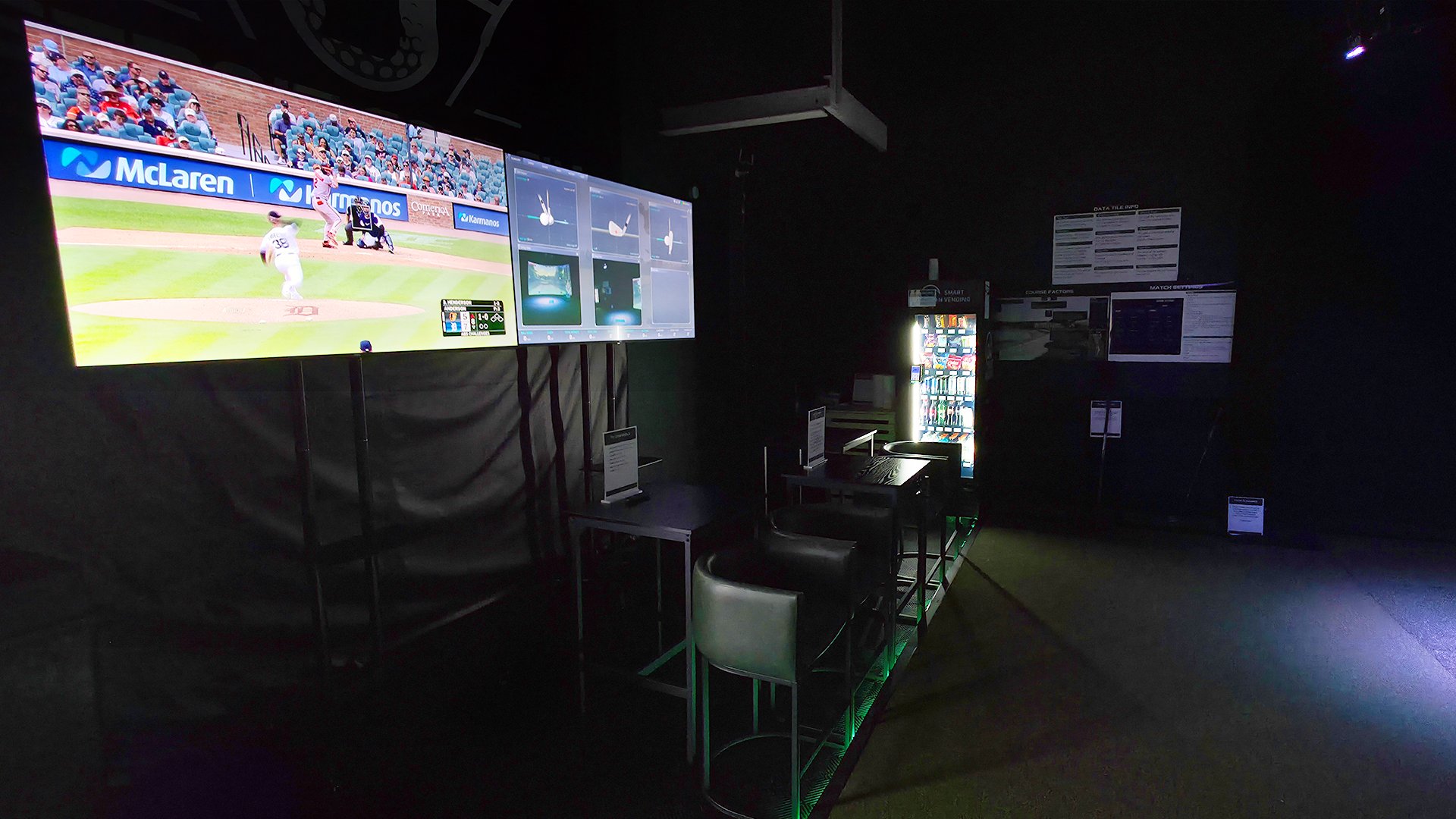 Lounge seating and TV wall at Detroit Golf Sim Madison Heights